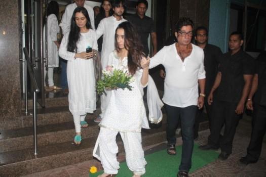 Photos of Bollywood Actress Shraddha Kapoor and family at her grandfather's Prayer Meet. Shraddha Kapoor, Siddhanth Kapoor, Padmini Kolhapure and Shakti Kapoor graced the event.
