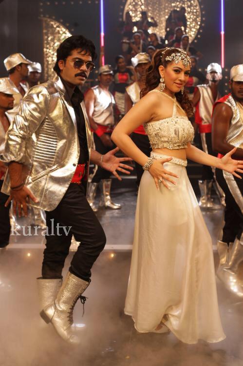South Indian Actor Simbu in Ajith, Rajini and MGR Getups in Tharu Maru Song. Simbu and Hansika Motwani starrer Vaalu Movie released on 14th August. Vaalu,Simbu,silambarasan,ajith,Rajini,rajinikanth,MGR,Simbu in Ajith,Rajini and MGR Getups,Simbu in Ajith Getups,Simbu in Rajini Getups,Simbu in MGR Getups,Simbu Getups