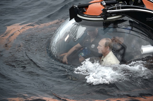Russian President Vladimir Putin is seen inside a research bathyscaphe while submerging into the waters of the Black Sea as he takes part in an expedition near Sevastopol, Crimea. Vladimir Putin,Vladimir Putin photos,Vladimir Putin news,putin bathyscaphe,Vladimir Putin under water