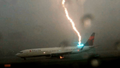 Photos of Lightning strikes Delta plane on Atlanta runway.