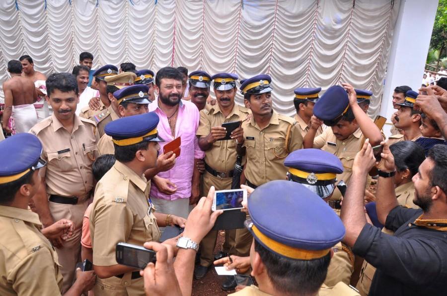 Malayalam actor Jayaram was snapped with Kerala Police officers. Jayaram,jayaram photos,jayaram with police,jayaram selfies with kerala police