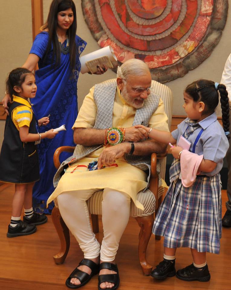 Indian Prime Minister Narendra Modi celebrated the special day with school children Narendra Modi,Narendra Modi rakhi,Narendra Modi rakhi celebrations,Narendra Modi raksha bandhan,raksha bandhan 2015,raksha bandhan celebrations