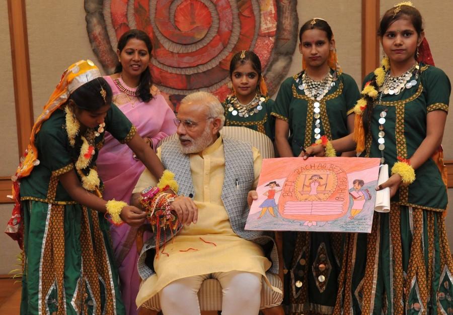 Indian Prime Minister Narendra Modi celebrated the special day with school children Narendra Modi,Narendra Modi rakhi,Narendra Modi rakhi celebrations,Narendra Modi raksha bandhan,raksha bandhan 2015,raksha bandhan celebrations