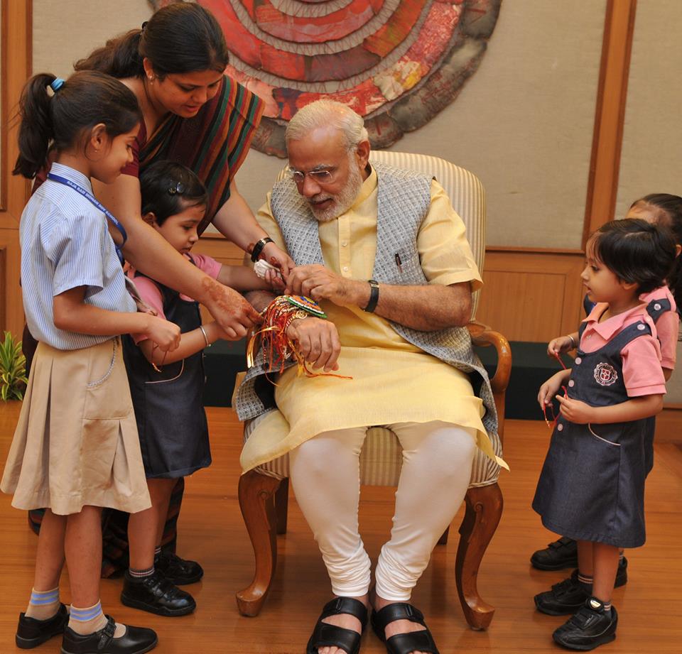 Indian Prime Minister Narendra Modi celebrated the special day with school children Narendra Modi,Narendra Modi rakhi,Narendra Modi rakhi celebrations,Narendra Modi raksha bandhan,raksha bandhan 2015,raksha bandhan celebrations