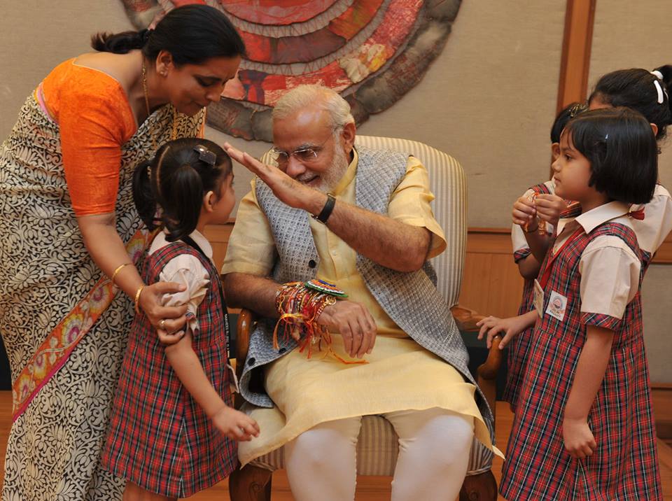 Indian Prime Minister Narendra Modi celebrated the special day with school children Narendra Modi,Narendra Modi rakhi,Narendra Modi rakhi celebrations,Narendra Modi raksha bandhan,raksha bandhan 2015,raksha bandhan celebrations