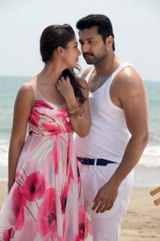 Photos of South Indian Actor Jayam Ravi and Actress Nayantara stills from Thani Oruvan Movie.