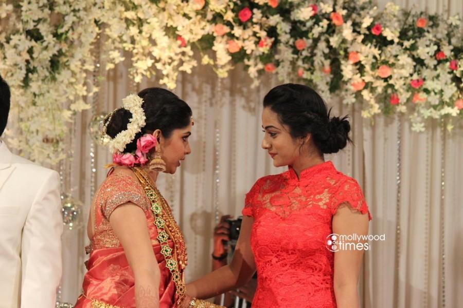 Celebrities from Malayalam entertainment industry attended the wedding receptiion of Muktha and Rinku Tomy. Muktha,muktha wedding reception,muktha reception photos,muktha rinku wedding reception