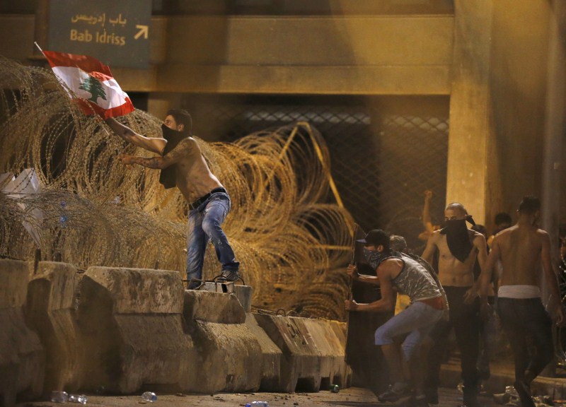 Thousands of protesters waving Lebanese flags and chanting Lebanon protests in Beirut,Lebanon,anti-government protests in Beirut,protests in Beirut,Beirut,Lebanese,protests,Lebanese national flags,Lebanese Pop star Myriam Klink,Pop star Myriam Klink,Myriam Klink