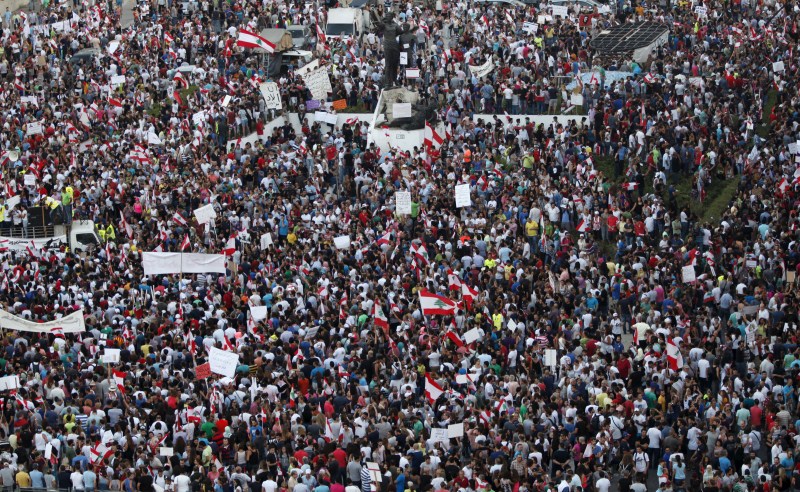 Thousands of protesters waving Lebanese flags and chanting Lebanon protests in Beirut,Lebanon,anti-government protests in Beirut,protests in Beirut,Beirut,Lebanese,protests,Lebanese national flags,Lebanese Pop star Myriam Klink,Pop star Myriam Klink,Myriam Klink