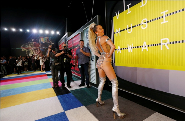 Singer and show host Miley Cyrus attended 2015 MTV Video Music Awards in Los Angeles, California. Miley cyrus,miley cyrus weird dressing,miley cyrus at MTV awards 2015,MTV Video Music Awards,miley cyrus MTV Video Music Awards