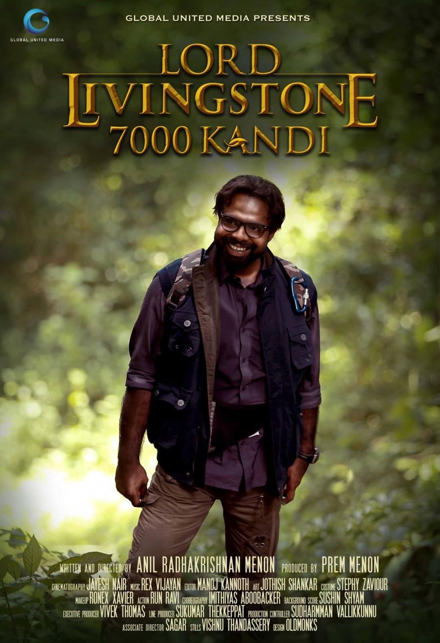 Check out first-look posters of Lord livingstone 7000 kandi,lord livingstone 7000 kandi first look,Lord livingstone 7000 Kandi character,lord livingstone poster,Kunchacko Boban,reenu Mathews,chemban vinod,anil radhakrishnan menon,actor bharath,jacob gregory,nedumudi venu