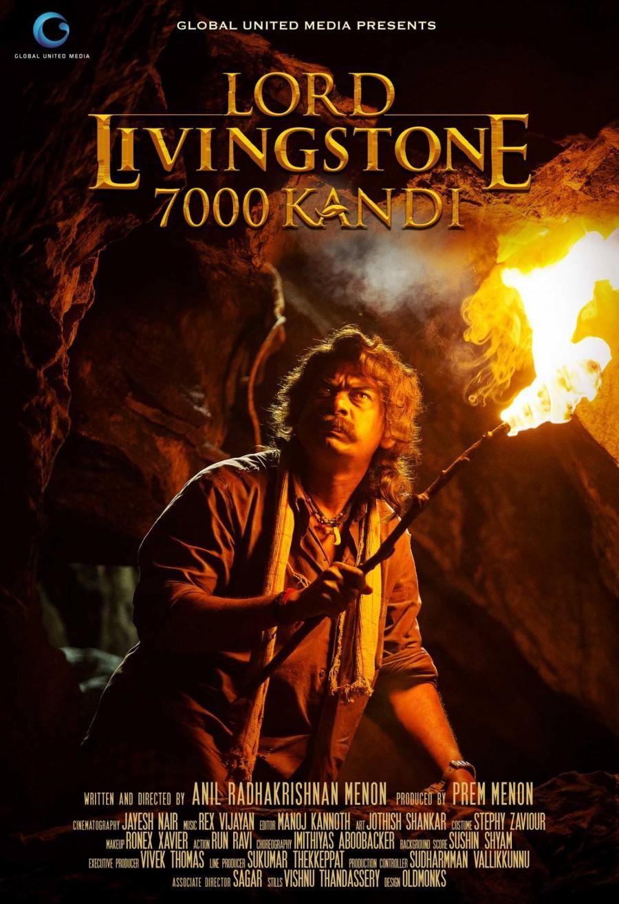 Check out first-look posters of Lord livingstone 7000 kandi,lord livingstone 7000 kandi first look,Lord livingstone 7000 Kandi character,lord livingstone poster,Kunchacko Boban,reenu Mathews,chemban vinod,anil radhakrishnan menon,actor bharath,jacob gregory,nedumudi venu