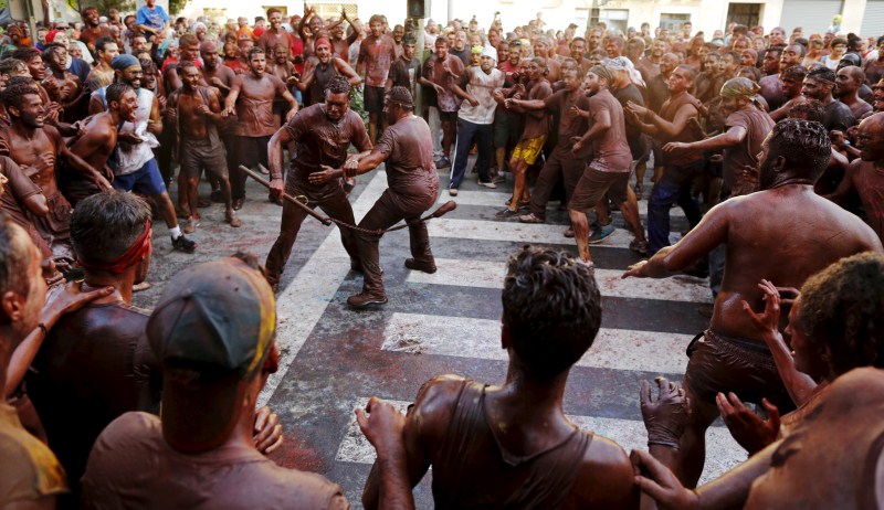 The festival was inspired by a dispute between the town of Baza and Guadix over the possession of an icon of the Virgin of Piedad. Cascamorras Festival,Cascamorras Festival 2015,Baza and Guadix,Virgin of Piedad,Cascamorras Festival pics,Cascamorras Festival images,Cascamorras Festival stills,Cascamorras Festival pictures,Cascamorras Festival photos,dirty festival