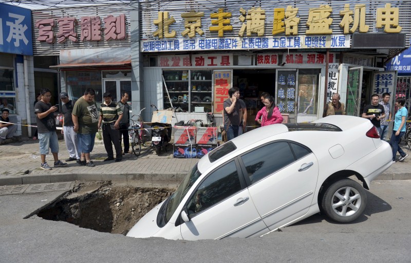 Sinkholes can be deadly - swallowing residents and damaging infrastructure. Sinkholes,Giant Sinkholes,deadly Sinkholes,Sinkholes Around the World,biggest Sinkholes