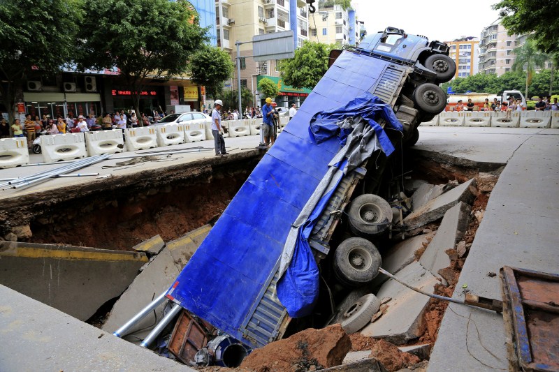 Sinkholes can be deadly - swallowing residents and damaging infrastructure. Sinkholes,Giant Sinkholes,deadly Sinkholes,Sinkholes Around the World,biggest Sinkholes