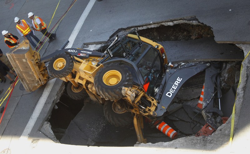 Sinkholes can be deadly - swallowing residents and damaging infrastructure. Sinkholes,Giant Sinkholes,deadly Sinkholes,Sinkholes Around the World,biggest Sinkholes