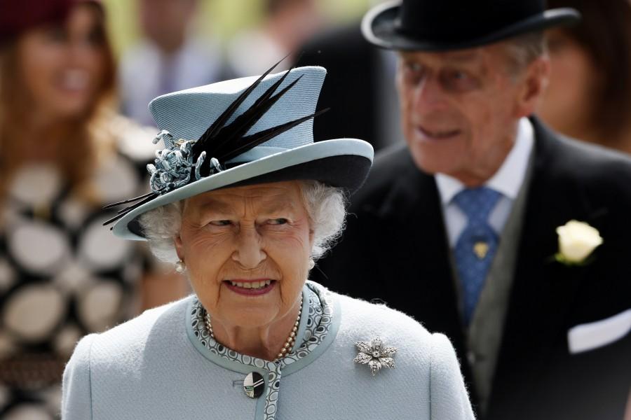 The Queen, who became the longest reigning British monarch on 9 September, is known for her stylish and colourful hats, worn throughout her 63 years on the throne. Queen Elizabeth II,queen elizabeth long reign,queen elizabeth record reign,63 year reign,longest reigning British monarch,Queen Victoria,Prince Philip,British Royal Family