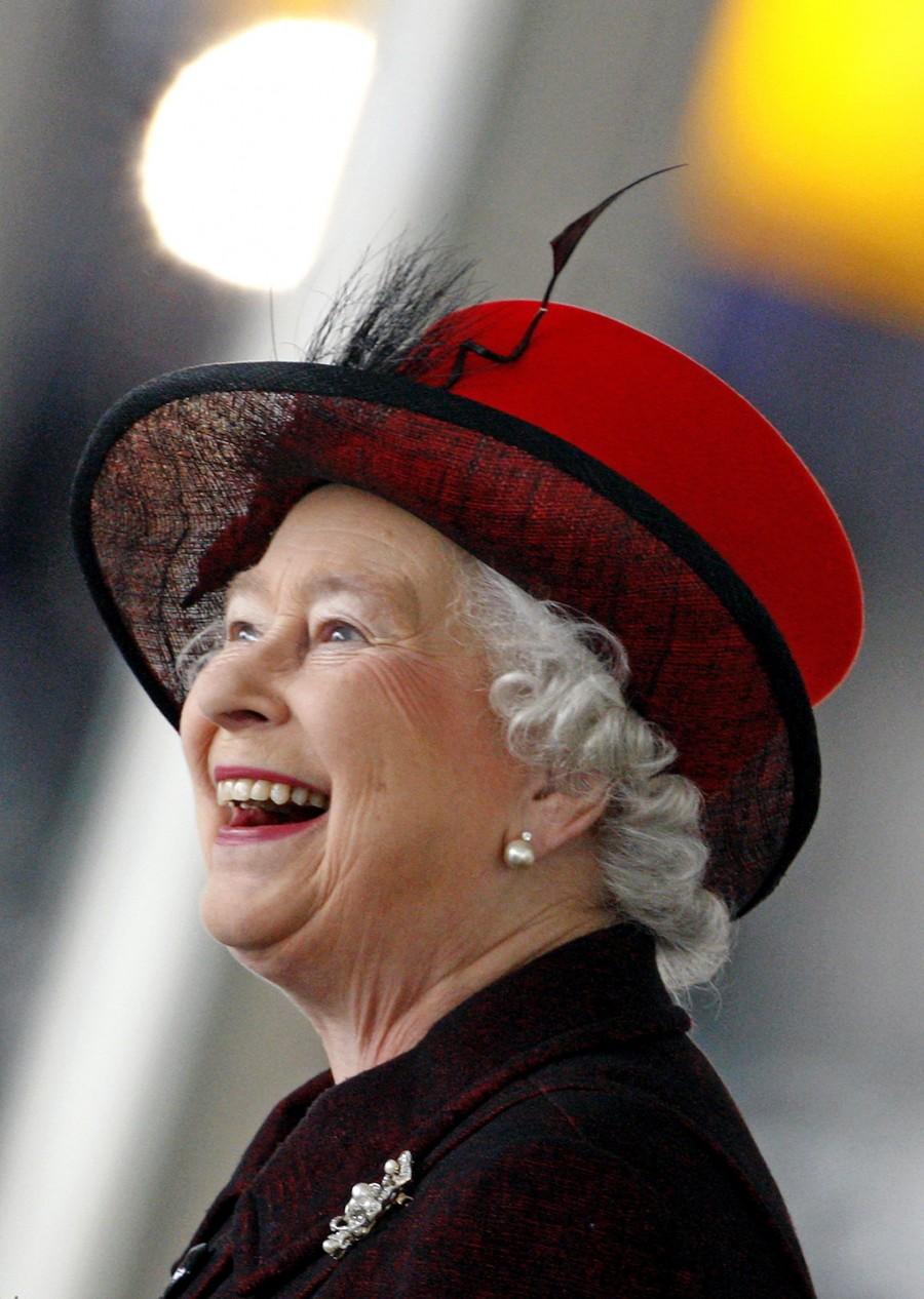 The Queen, who became the longest reigning British monarch on 9 September, is known for her stylish and colourful hats, worn throughout her 63 years on the throne. Queen Elizabeth II,queen elizabeth long reign,queen elizabeth record reign,63 year reign,longest reigning British monarch,Queen Victoria,Prince Philip,British Royal Family