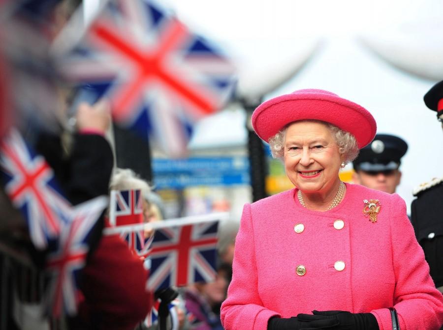 The Queen, who became the longest reigning British monarch on 9 September, is known for her stylish and colourful hats, worn throughout her 63 years on the throne. Queen Elizabeth II,queen elizabeth long reign,queen elizabeth record reign,63 year reign,longest reigning British monarch,Queen Victoria,Prince Philip,British Royal Family