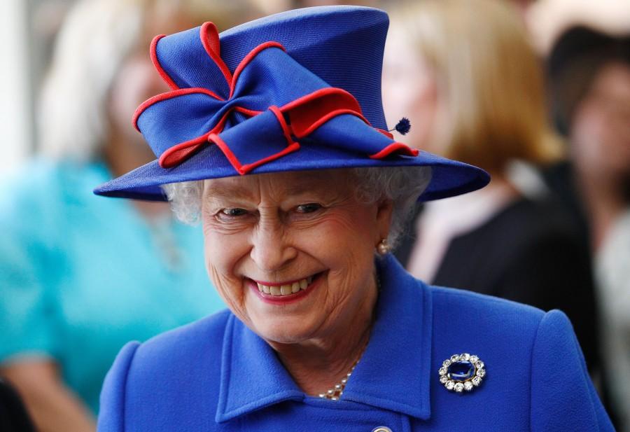 The Queen, who became the longest reigning British monarch on 9 September, is known for her stylish and colourful hats, worn throughout her 63 years on the throne. Queen Elizabeth II,queen elizabeth long reign,queen elizabeth record reign,63 year reign,longest reigning British monarch,Queen Victoria,Prince Philip,British Royal Family
