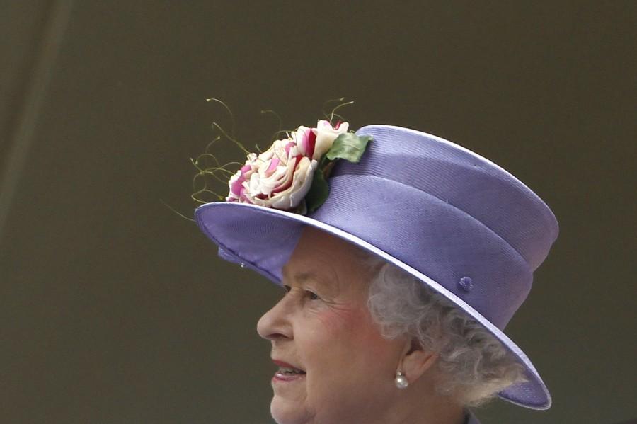The Queen, who became the longest reigning British monarch on 9 September, is known for her stylish and colourful hats, worn throughout her 63 years on the throne. Queen Elizabeth II,queen elizabeth long reign,queen elizabeth record reign,63 year reign,longest reigning British monarch,Queen Victoria,Prince Philip,British Royal Family