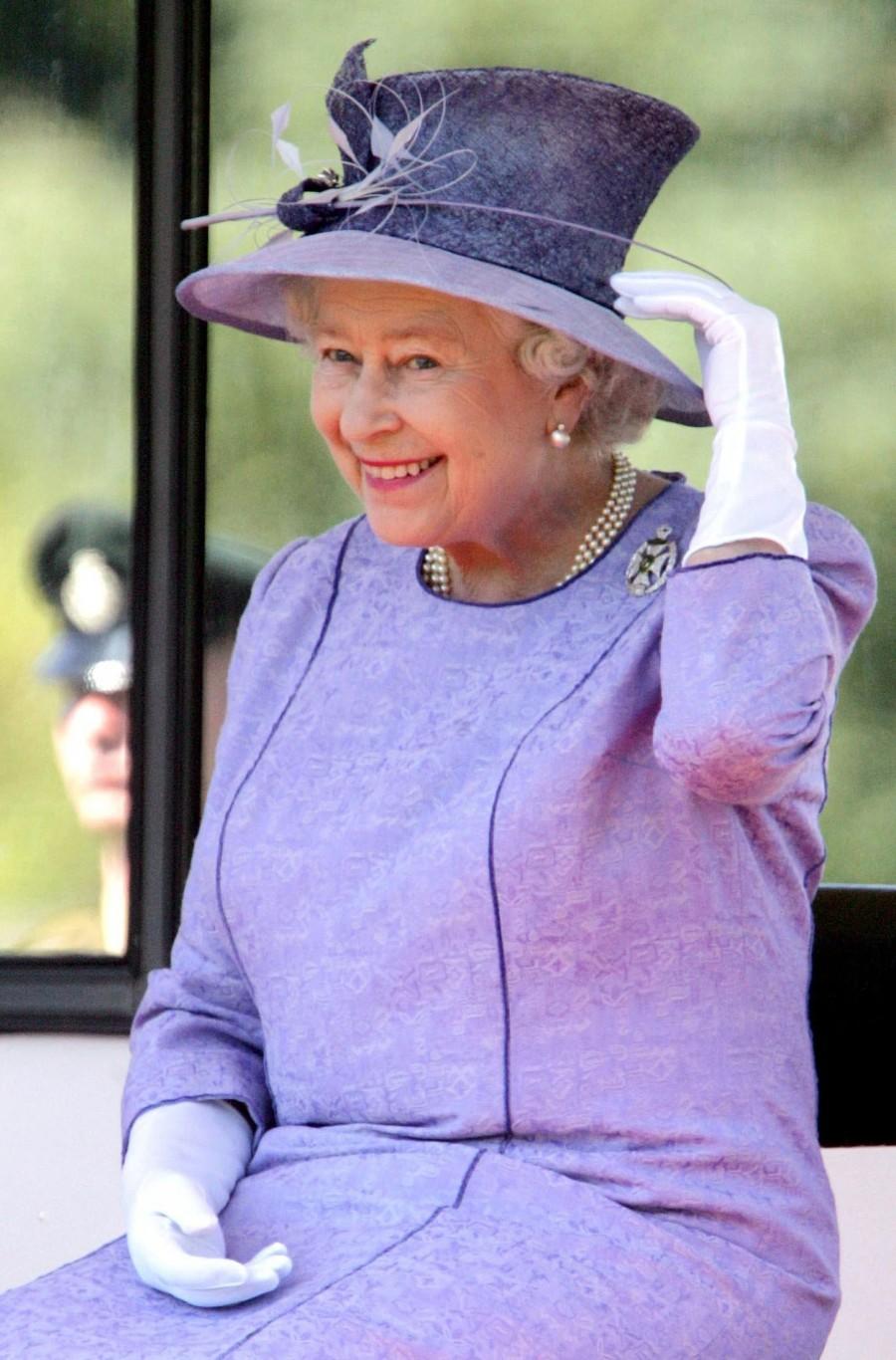 The Queen, who became the longest reigning British monarch on 9 September, is known for her stylish and colourful hats, worn throughout her 63 years on the throne. Queen Elizabeth II,queen elizabeth long reign,queen elizabeth record reign,63 year reign,longest reigning British monarch,Queen Victoria,Prince Philip,British Royal Family
