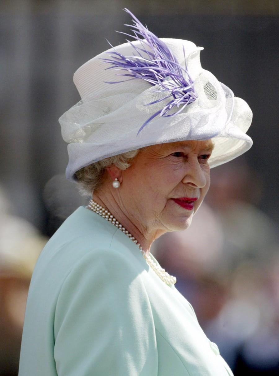 The Queen, who became the longest reigning British monarch on 9 September, is known for her stylish and colourful hats, worn throughout her 63 years on the throne. Queen Elizabeth II,queen elizabeth long reign,queen elizabeth record reign,63 year reign,longest reigning British monarch,Queen Victoria,Prince Philip,British Royal Family