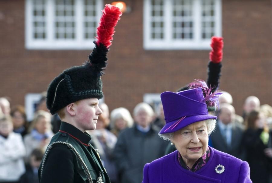 The Queen, who became the longest reigning British monarch on 9 September, is known for her stylish and colourful hats, worn throughout her 63 years on the throne. Queen Elizabeth II,queen elizabeth long reign,queen elizabeth record reign,63 year reign,longest reigning British monarch,Queen Victoria,Prince Philip,British Royal Family