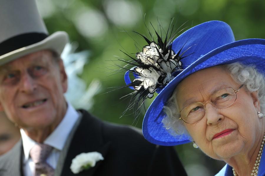 The Queen, who became the longest reigning British monarch on 9 September, is known for her stylish and colourful hats, worn throughout her 63 years on the throne. Queen Elizabeth II,queen elizabeth long reign,queen elizabeth record reign,63 year reign,longest reigning British monarch,Queen Victoria,Prince Philip,British Royal Family
