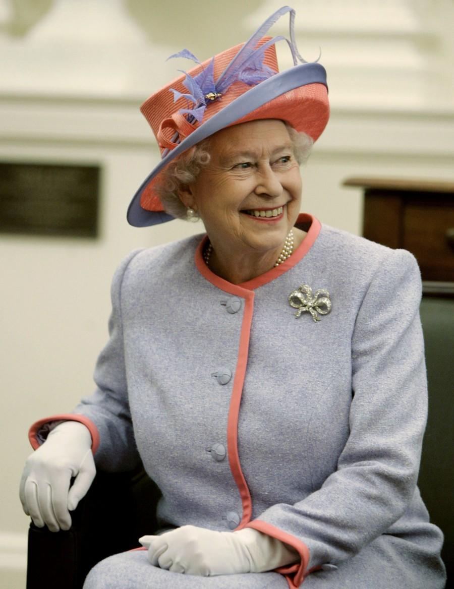 The Queen, who became the longest reigning British monarch on 9 September, is known for her stylish and colourful hats, worn throughout her 63 years on the throne. Queen Elizabeth II,queen elizabeth long reign,queen elizabeth record reign,63 year reign,longest reigning British monarch,Queen Victoria,Prince Philip,British Royal Family