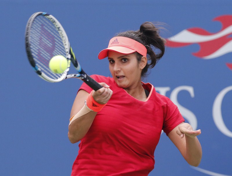 Sania Mirza and Martina Hingis beat Casey Dellacqua and Yaroslava Shvedova 6-3, 6-3 to win the US Open women's doubles title in New York on Sunday. Sania Mirza,Martina Hingis,Sania Mirza and Martina Hingis,US Open womens doubles title,US Open 2015,Casey Dellacqua,Yaroslava Shvedova,US Open 2015 final,US Open Championships