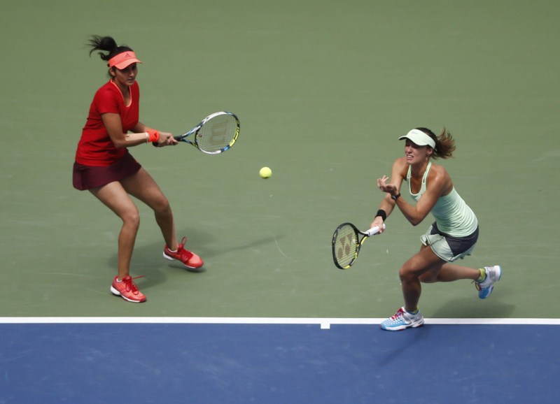 Sania Mirza and Martina Hingis beat Casey Dellacqua and Yaroslava Shvedova 6-3, 6-3 to win the US Open women's doubles title in New York on Sunday. Sania Mirza,Martina Hingis,Sania Mirza and Martina Hingis,US Open womens doubles title,US Open 2015,Casey Dellacqua,Yaroslava Shvedova,US Open 2015 final,US Open Championships