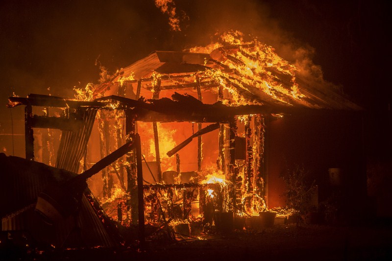 A Northern California wildfire ranked as the most destructive to hit the drought-stricken U.S. West this year has killed a woman and burned some 400 homes to the ground, fire officials said on Monday and they expect the property toll to climb. California Wildfire,Northern California wildfire,wildfire,Hundreds of houses go up in flames,houses go up in flames