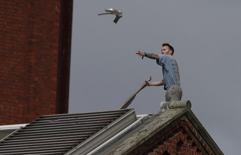 Prisoner Stuart Horner, a convicted murderer, has spent two nights on the roof of Manchester's 'Strangeways' prison to protest conditions inside the jail. Stuart Horner,Prison Roof Protest,Roof Protest,killer Stuart Horner,Manchester,Strangeways
