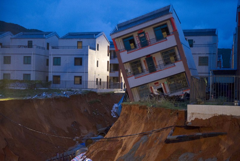 Houses teetering on the brink after being buffeted by natural disasters from typhoons to landslides. Houses on the Edge,landslides