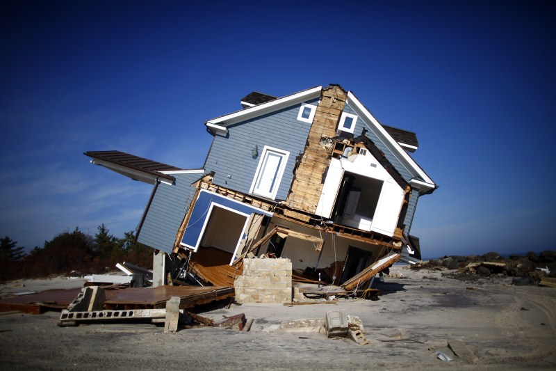 Houses teetering on the brink after being buffeted by natural disasters from typhoons to landslides. Houses on the Edge,landslides