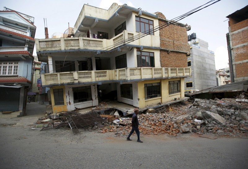 Houses teetering on the brink after being buffeted by natural disasters from typhoons to landslides. Houses on the Edge,landslides