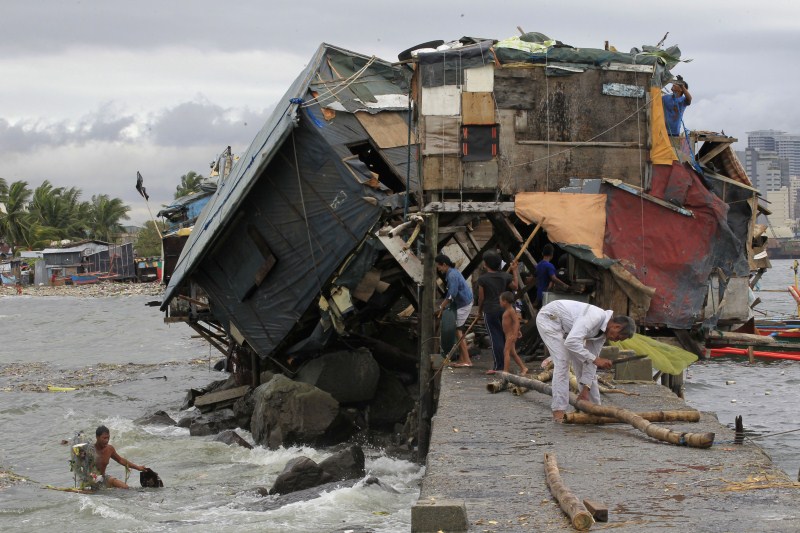 Houses teetering on the brink after being buffeted by natural disasters from typhoons to landslides. Houses on the Edge,landslides