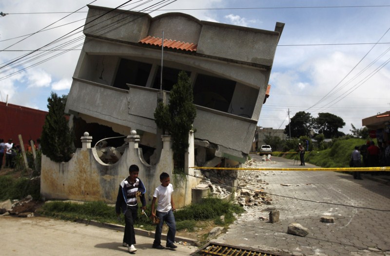 Houses teetering on the brink after being buffeted by natural disasters from typhoons to landslides. Houses on the Edge,landslides