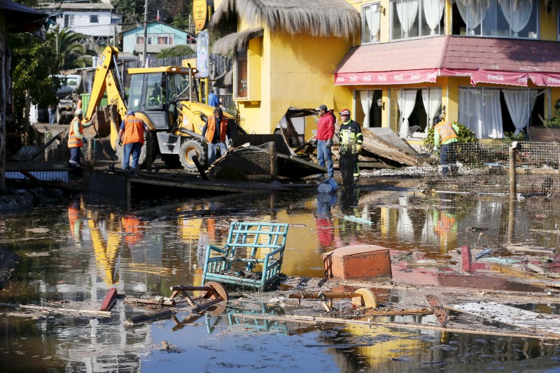A magnitude 8.3 earthquake in central Chile killed 11 people and slammed powerful waves into coastal towns, forcing more than a million people from their homes. Chile Rocked by Earthquake,Earthquake,Chile Earthquake,Earthquake in Chile,8.3 earthquake,8.3 magnitude earthquake