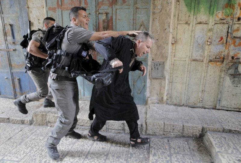 Jerusalem has seen days of clashes after Israeli police fired stun grenades and tear gas at rock-throwing Palestinians who barricaded themselves inside al-Aqsa mosque. Israeli police,Palestinians in Jerusalem,Clashes in Jerusalem,al-Aqsa mosque,Palestinian protester