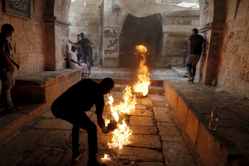 Jerusalem has seen days of clashes after Israeli police fired stun grenades and tear gas at rock-throwing Palestinians who barricaded themselves inside al-Aqsa mosque. Israeli police,Palestinians in Jerusalem,Clashes in Jerusalem,al-Aqsa mosque,Palestinian protester