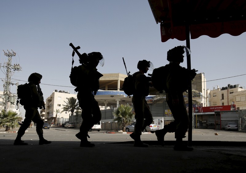 Jerusalem has seen days of clashes after Israeli police fired stun grenades and tear gas at rock-throwing Palestinians who barricaded themselves inside al-Aqsa mosque. Israeli police,Palestinians in Jerusalem,Clashes in Jerusalem,al-Aqsa mosque,Palestinian protester