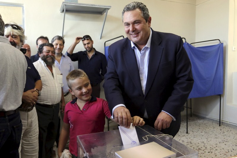 Greek leftist Alexis Tsipras stormed back into office with an unexpectedly decisive election victory on Sunday, claiming a clear mandate to steer Greece's battered economy to recovery. Tsipras,Tsipras Wins Greek Election,Greek Election,Alexis Tsipras,election victory