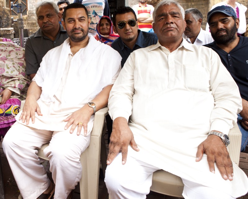 Aamir Khan's next movie Dangal was launched at an opening ceremony held in Ludhiana, Punjab on 21 September 2015. Aamir Khan,Mahavir Singh Phogat,Dangal movie launch,Dangal,Dangal shooting,Siddharth Roy Kapur,Amrita Pandey,Dangal movie pooja,Aamir Khan in Dangal