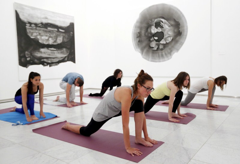 From museums to Times Square - yoga being practiced in unusual places. Yoga,Yoga in unexpected places,Yoga practices,different type of yoga,Performing yoga at unexpected places