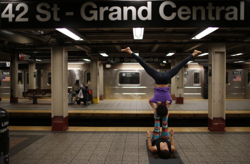 From museums to Times Square - yoga being practiced in unusual places. Yoga,Yoga in unexpected places,Yoga practices,different type of yoga,Performing yoga at unexpected places