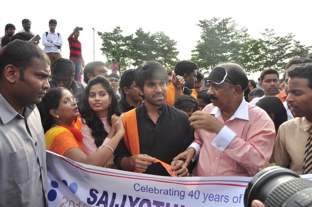 South Indian actor Ram Charan attends the Deonar World Sight Day Walk 2015 on Necklace road in Hyderabad on 4 October. Ram Charan,actor Ram Charan,World Sight Day Walk 2015,World Sight Day 2015,World Sight Day,Ram Charan at Deonar World Sight Day Walk 2015,Ram Charan walks at Deonar World Sight Day 2015,Mission to Give Vision
