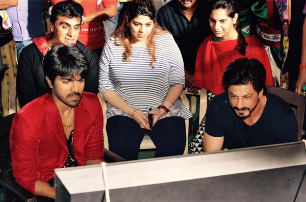 Bollywood actor Shah Rukh Khan with Ram Charan on the sets of 'Bruce Lee - The Fighter'. Shah Rukh Khan,Shahrukh Khan,Ram Charan,Shah Rukh Khan meets Ram Charan,Bruce Lee - The Fighter,Bruce Lee