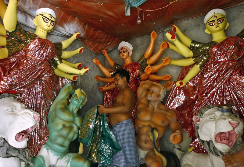 The Durga Puja festival will be celebrated from 19 - 22 October, which is the biggest religious event for Bengali Hindus. Hindus believe that the goddess Durga symbolises power and the triumph of good over evil. Durga Puja 2015,Durga Puja,Durga pooja,Durga pooja 2015,Durgotsava,Sharadotsav,Sharadotsav 2015,Hindu festival,Hindu goddess Durga,goddess Durga